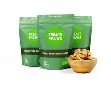Load image into Gallery viewer, Treats4Paws peanut butter dog treats are a great reward for dog training.
